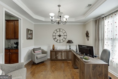 Welcome to this spacious and well-maintained 5-bedroom, 3-bath on Hampton Golf Village in Georgia - for sale on GolfHomes.com, golf home, golf lot