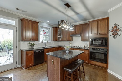 Welcome to this spacious and well-maintained 5-bedroom, 3-bath on Hampton Golf Village in Georgia - for sale on GolfHomes.com, golf home, golf lot