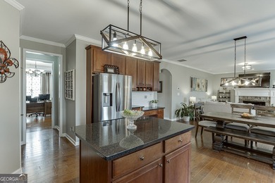 Welcome to this spacious and well-maintained 5-bedroom, 3-bath on Hampton Golf Village in Georgia - for sale on GolfHomes.com, golf home, golf lot