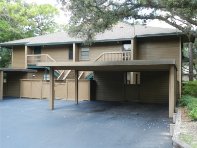 Freshly painted 2 bedroom, 2 bath ground floor end unit with1 on Innisbrook Resort and Golf Club in Florida - for sale on GolfHomes.com, golf home, golf lot