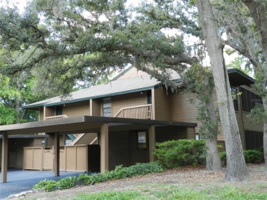 Freshly painted 2 bedroom, 2 bath ground floor end unit with1 on Innisbrook Resort and Golf Club in Florida - for sale on GolfHomes.com, golf home, golf lot