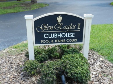 Freshly painted 2 bedroom, 2 bath ground floor end unit with1 on Innisbrook Resort and Golf Club in Florida - for sale on GolfHomes.com, golf home, golf lot