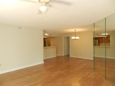 Freshly painted 2 bedroom, 2 bath ground floor end unit with1 on Innisbrook Resort and Golf Club in Florida - for sale on GolfHomes.com, golf home, golf lot
