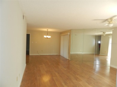 Freshly painted 2 bedroom, 2 bath ground floor end unit with1 on Innisbrook Resort and Golf Club in Florida - for sale on GolfHomes.com, golf home, golf lot
