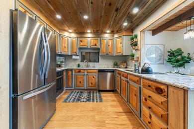This beautiful three-bedroom, two-bath A-frame cabin perfectly on Tahoe Donner Golf Course in California - for sale on GolfHomes.com, golf home, golf lot