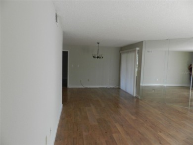 Freshly painted 2 bedroom, 2 bath ground floor end unit with1 on Innisbrook Resort and Golf Club in Florida - for sale on GolfHomes.com, golf home, golf lot