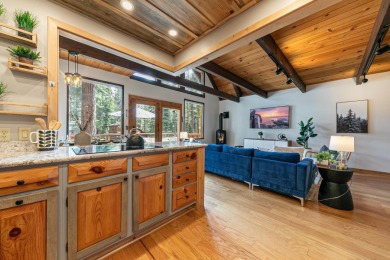 This beautiful three-bedroom, two-bath A-frame cabin perfectly on Tahoe Donner Golf Course in California - for sale on GolfHomes.com, golf home, golf lot