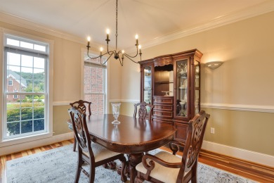 This Stately, all brick colonial is situated on over 1/2 acre on Pete Dye River Course of Virginia Tech in Virginia - for sale on GolfHomes.com, golf home, golf lot