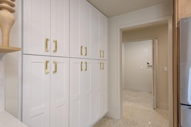 Fully reimagined Fairway Estates home offering over 3,300 sq ft on The Dunedin Country Club in Florida - for sale on GolfHomes.com, golf home, golf lot