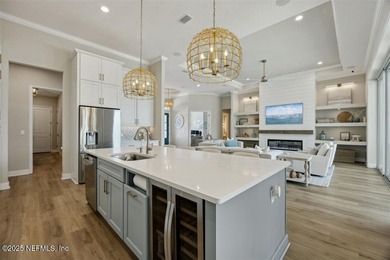 Step inside this stunning Egret V by ICI Homes, offering 4 on Amelia National Golf and Country Club in Florida - for sale on GolfHomes.com, golf home, golf lot