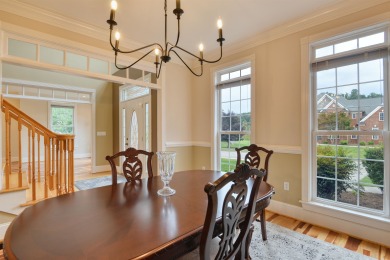This Stately, all brick colonial is situated on over 1/2 acre on Pete Dye River Course of Virginia Tech in Virginia - for sale on GolfHomes.com, golf home, golf lot
