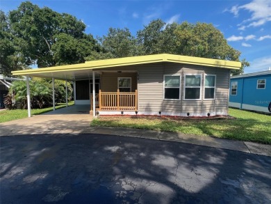 This beautifully remodeled 1,584 square foot, two-bedroom on Palm Hill Golf Club in Florida - for sale on GolfHomes.com, golf home, golf lot