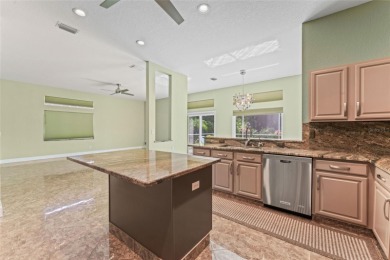 Looking for the perfect home in Sun City Center? This one truly on Caloosa Greens Executive Golf Course in Florida - for sale on GolfHomes.com, golf home, golf lot