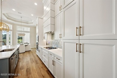 Step inside this stunning Egret V by ICI Homes, offering 4 on Amelia National Golf and Country Club in Florida - for sale on GolfHomes.com, golf home, golf lot