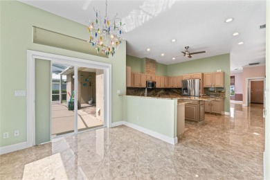 Looking for the perfect home in Sun City Center? This one truly on Caloosa Greens Executive Golf Course in Florida - for sale on GolfHomes.com, golf home, golf lot
