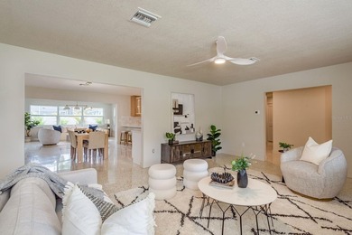 Fully reimagined Fairway Estates home offering over 3,300 sq ft on The Dunedin Country Club in Florida - for sale on GolfHomes.com, golf home, golf lot