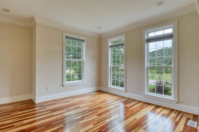 This Stately, all brick colonial is situated on over 1/2 acre on Pete Dye River Course of Virginia Tech in Virginia - for sale on GolfHomes.com, golf home, golf lot