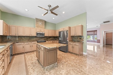 Looking for the perfect home in Sun City Center? This one truly on Caloosa Greens Executive Golf Course in Florida - for sale on GolfHomes.com, golf home, golf lot