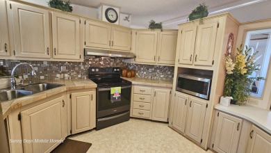 PRICE REDUCED!! Welcome to this charming home nestled in on The Riverside Golf Club in Florida - for sale on GolfHomes.com, golf home, golf lot