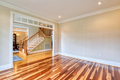 This Stately, all brick colonial is situated on over 1/2 acre on Pete Dye River Course of Virginia Tech in Virginia - for sale on GolfHomes.com, golf home, golf lot