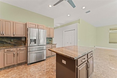 Looking for the perfect home in Sun City Center? This one truly on Caloosa Greens Executive Golf Course in Florida - for sale on GolfHomes.com, golf home, golf lot