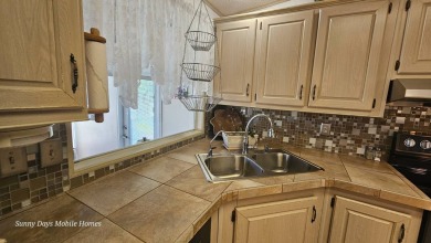 PRICE REDUCED!! Welcome to this charming home nestled in on The Riverside Golf Club in Florida - for sale on GolfHomes.com, golf home, golf lot