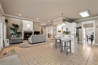 Welcome to your very own everyday retreat. Overlooking the River on Eagle Crest Golf Course in Arkansas - for sale on GolfHomes.com, golf home, golf lot