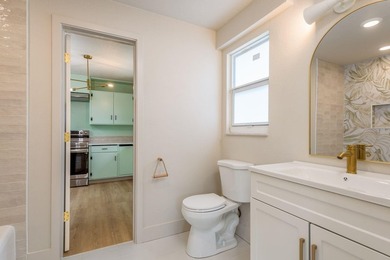 Fully reimagined Fairway Estates home offering over 3,300 sq ft on The Dunedin Country Club in Florida - for sale on GolfHomes.com, golf home, golf lot