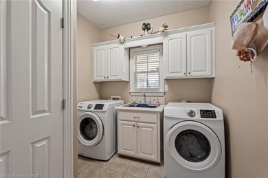 Welcome to your very own everyday retreat. Overlooking the River on Eagle Crest Golf Course in Arkansas - for sale on GolfHomes.com, golf home, golf lot