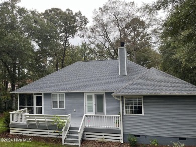 Welcome to your retreat in Boiling Spring Lakes! This home is on The Lakes Country Club in North Carolina - for sale on GolfHomes.com, golf home, golf lot