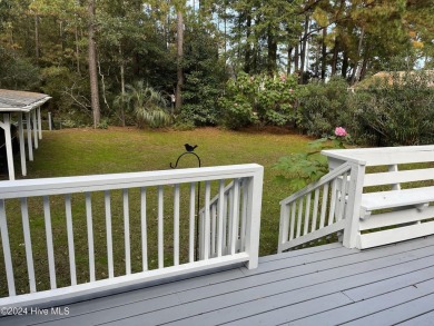 Welcome to your retreat in Boiling Spring Lakes! This home is on The Lakes Country Club in North Carolina - for sale on GolfHomes.com, golf home, golf lot