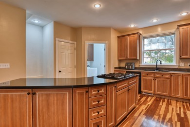 This Stately, all brick colonial is situated on over 1/2 acre on Pete Dye River Course of Virginia Tech in Virginia - for sale on GolfHomes.com, golf home, golf lot