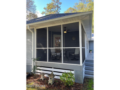 Welcome to your retreat in Boiling Spring Lakes! This home is on The Lakes Country Club in North Carolina - for sale on GolfHomes.com, golf home, golf lot