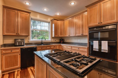 This Stately, all brick colonial is situated on over 1/2 acre on Pete Dye River Course of Virginia Tech in Virginia - for sale on GolfHomes.com, golf home, golf lot
