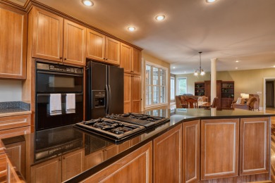 This Stately, all brick colonial is situated on over 1/2 acre on Pete Dye River Course of Virginia Tech in Virginia - for sale on GolfHomes.com, golf home, golf lot
