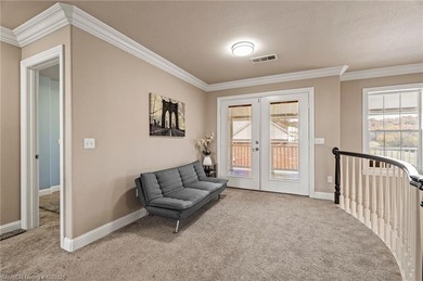 Welcome to your very own everyday retreat. Overlooking the River on Eagle Crest Golf Course in Arkansas - for sale on GolfHomes.com, golf home, golf lot