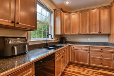 This Stately, all brick colonial is situated on over 1/2 acre on Pete Dye River Course of Virginia Tech in Virginia - for sale on GolfHomes.com, golf home, golf lot