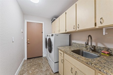 Looking for the perfect home in Sun City Center? This one truly on Caloosa Greens Executive Golf Course in Florida - for sale on GolfHomes.com, golf home, golf lot