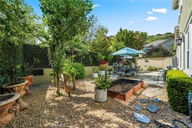 Perched atop a quiet single loaded street near the end of a on Talega Golf Club in California - for sale on GolfHomes.com, golf home, golf lot