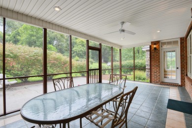 This Stately, all brick colonial is situated on over 1/2 acre on Pete Dye River Course of Virginia Tech in Virginia - for sale on GolfHomes.com, golf home, golf lot