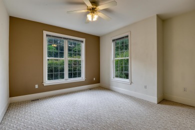 This Stately, all brick colonial is situated on over 1/2 acre on Pete Dye River Course of Virginia Tech in Virginia - for sale on GolfHomes.com, golf home, golf lot
