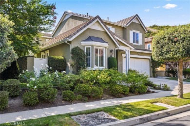 Perched atop a quiet single loaded street near the end of a on Talega Golf Club in California - for sale on GolfHomes.com, golf home, golf lot