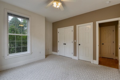 This Stately, all brick colonial is situated on over 1/2 acre on Pete Dye River Course of Virginia Tech in Virginia - for sale on GolfHomes.com, golf home, golf lot