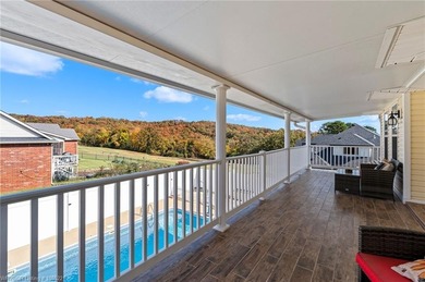 Welcome to your very own everyday retreat. Overlooking the River on Eagle Crest Golf Course in Arkansas - for sale on GolfHomes.com, golf home, golf lot