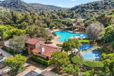 Perched atop a quiet single loaded street near the end of a on Talega Golf Club in California - for sale on GolfHomes.com, golf home, golf lot