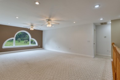 This Stately, all brick colonial is situated on over 1/2 acre on Pete Dye River Course of Virginia Tech in Virginia - for sale on GolfHomes.com, golf home, golf lot