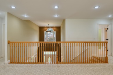 This Stately, all brick colonial is situated on over 1/2 acre on Pete Dye River Course of Virginia Tech in Virginia - for sale on GolfHomes.com, golf home, golf lot