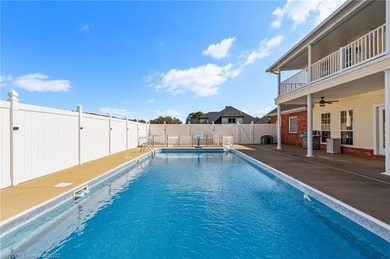 Welcome to your very own everyday retreat. Overlooking the River on Eagle Crest Golf Course in Arkansas - for sale on GolfHomes.com, golf home, golf lot