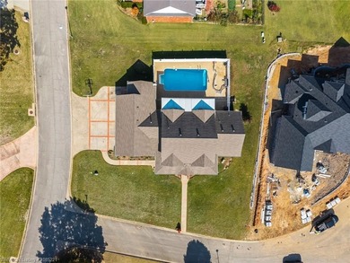 Welcome to your very own everyday retreat. Overlooking the River on Eagle Crest Golf Course in Arkansas - for sale on GolfHomes.com, golf home, golf lot