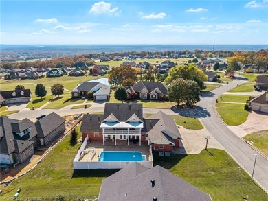 Welcome to your very own everyday retreat. Overlooking the River on Eagle Crest Golf Course in Arkansas - for sale on GolfHomes.com, golf home, golf lot